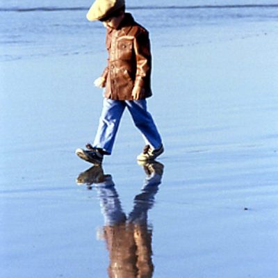 Child Walking On Beach, Spain - Color
